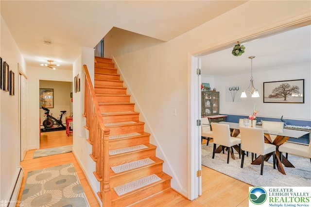 113 S Fairview St, Macungie Borough, PA 18062 - stairs featuring baseboard heating, wood finished floors, and baseboards