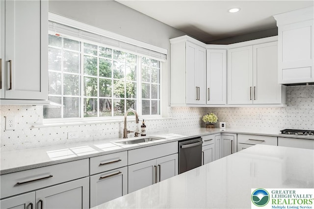 2638 Hollow View Dr, Forks Twp, PA 18040 - kitchen with a sink, stainless steel appliances, decorative backsplash, white cabinets, and recessed lighting