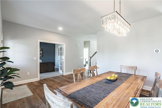 2638 Hollow View Dr, Forks Twp, PA 18040 - dining room featuring wood finished floors, a chandelier, and baseboards