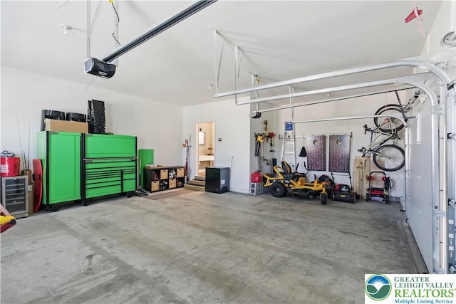 2638 Hollow View Dr, Forks Twp, PA 18040 - garage with a garage door opener and wine cooler