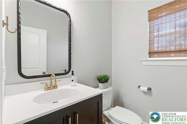 2638 Hollow View Dr, Forks Twp, PA 18040 - bathroom featuring healthy amount of natural light, toilet, and vanity