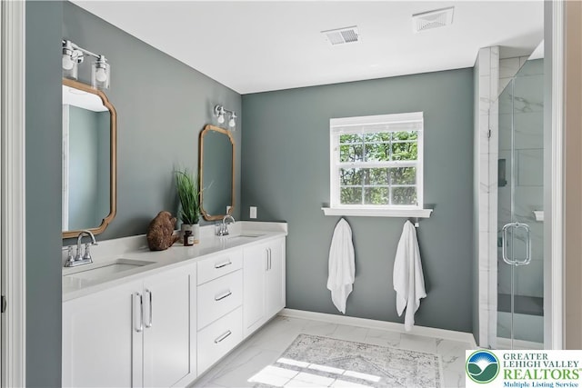 2638 Hollow View Dr, Forks Twp, PA 18040 - full bath with double vanity, marble finish flooring, a shower stall, and baseboards