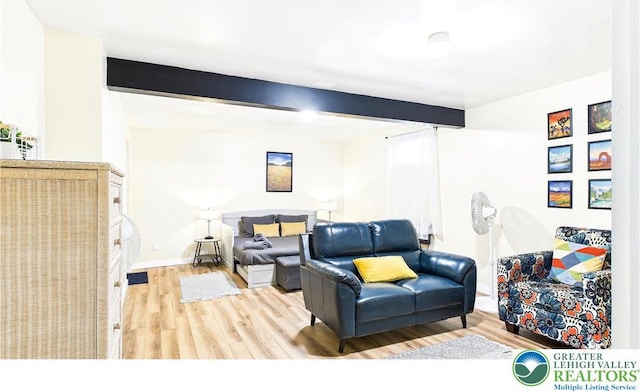 177 Dogwood Ter, Tunkhannock Township, PA 18210 - living area featuring beamed ceiling and wood finished floors