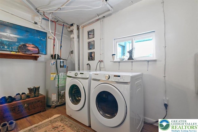 413 S Ave, Jim Thorpe Borough, PA 18229 - washroom featuring gas water heater, washing machine and dryer, and wood finished floors