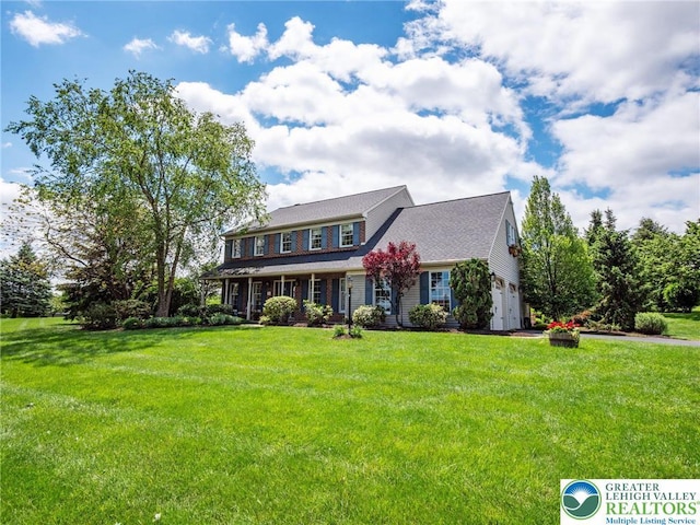 3840 E View Dr, North Whitehall Twp, PA 18069 - colonial inspired home with an attached garage and a front yard