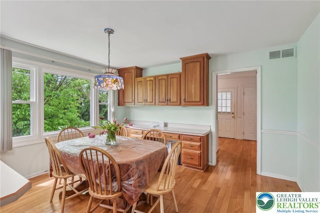 1450 Springhouse Rd, South Whitehall Twp, PA 18104 - dining area with light wood-type flooring and baseboards
