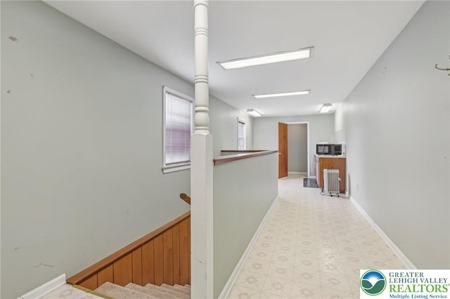 1450 Springhouse Rd, South Whitehall Twp, PA 18104 - corridor with light floors, an upstairs landing, and baseboards