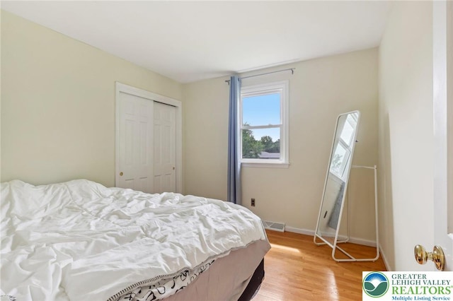1450 Springhouse Rd, South Whitehall Twp, PA 18104 - bedroom with a closet, light wood finished floors, and baseboards