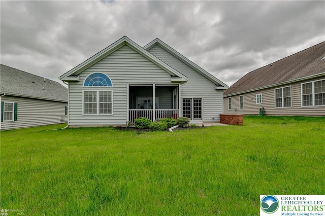 2605 Victory Way, Hanover Twp, PA 18017 - rear view of house with a yard