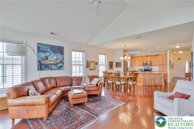 2605 Victory Way, Hanover Twp, PA 18017 - living area featuring a chandelier, ceiling fan, light wood-style floors, recessed lighting, and lofted ceiling