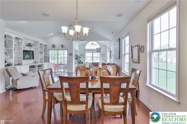 2605 Victory Way, Hanover Twp, PA 18017 - dining room with a chandelier, healthy amount of natural light, wood finished floors, lofted ceiling, and baseboards