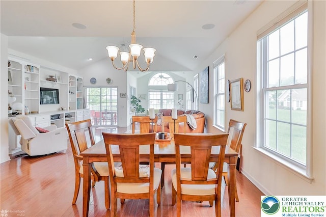 2605 Victory Way, Hanover Twp, PA 18017 - dining area featuring light wood-style floors, healthy amount of natural light, a chandelier, and lofted ceiling