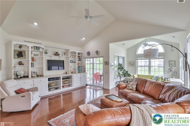 2605 Victory Way, Hanover Twp, PA 18017 - living area featuring vaulted ceiling, wood finished floors, and a ceiling fan