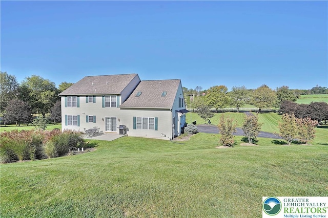 4408 Irish Creek Rd, Pa, PA 19506 - rear view of property with a patio area, a yard, and roof with shingles