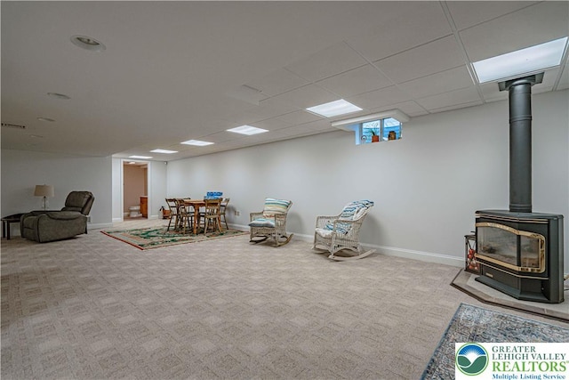 4408 Irish Creek Rd, Pa, PA 19506 - living area with a wood stove, carpet floors, and baseboards