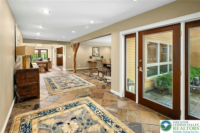 310 Hunters Farm Rd, Paradise Twp, PA 18332 - foyer featuring stone tile floors, baseboards, and recessed lighting