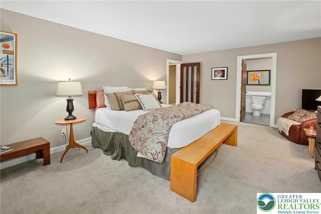310 Hunters Farm Rd, Paradise Twp, PA 18332 - bedroom with carpet floors, baseboards, and ensuite bathroom