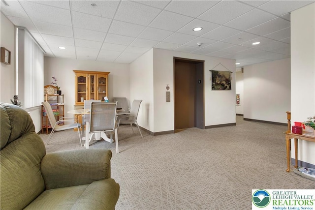 2121 Hokendauqua Ave Unit 210, Northampton Borough, PA 18067 - living room featuring elevator, baseboards, recessed lighting, a paneled ceiling, and carpet