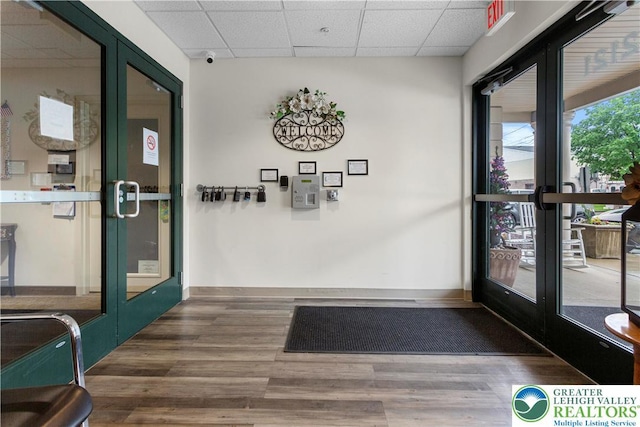 2121 Hokendauqua Ave Unit 210, Northampton Borough, PA 18067 - corridor with french doors, wood finished floors, a drop ceiling, and baseboards
