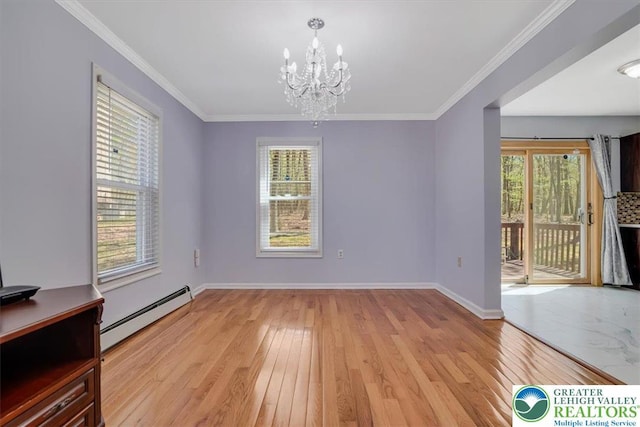 190 Reunion Rdg, Stroud Twp, PA 18301 - unfurnished dining area with a baseboard radiator, a chandelier, light wood-style flooring, healthy amount of natural light, and ornamental molding