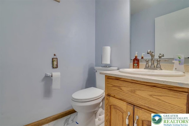 190 Reunion Rdg, Stroud Twp, PA 18301 - bathroom featuring toilet, vanity, and marble look tiles