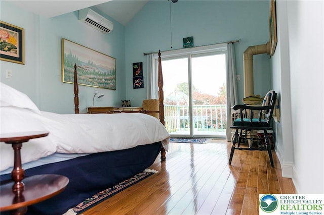 433 S 19th St, Easton, PA 18042 - bedroom featuring a wall mounted air conditioner, access to exterior, wood-type flooring, and high vaulted ceiling
