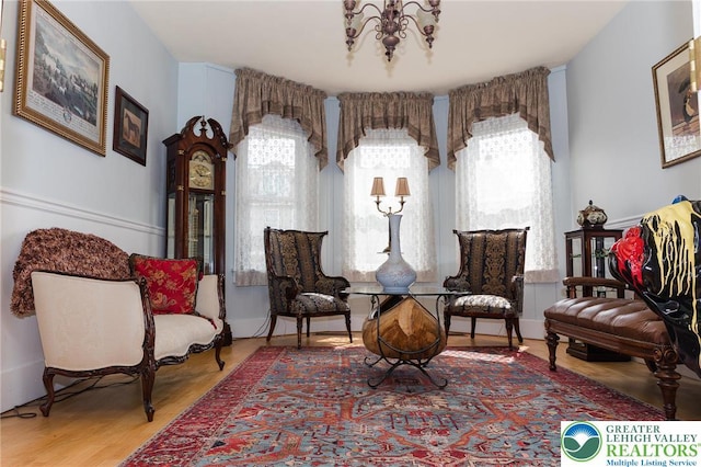 433 S 19th St, Easton, PA 18042 - living area with a chandelier and wood finished floors