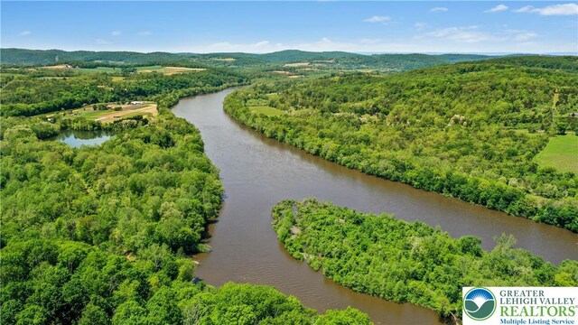 511 Center Hill Rd, Nockamixon Twp, PA 18972 - drone / aerial view of a water and mountain view and a heavily wooded area