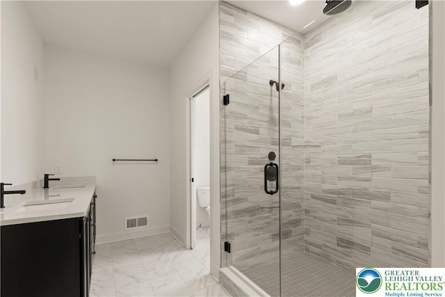 1350 Lorton Dr Unit 56, Forks Twp, PA 18040 - full bathroom with marble finish floors, a stall shower, vanity, and baseboards