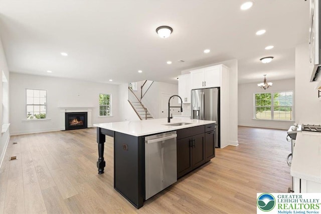 1350 Lorton Dr Unit 56, Forks Twp, PA 18040 - kitchen with stainless steel appliances, a sink, light countertops, open floor plan, and recessed lighting