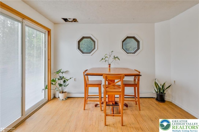 717 Frost Hollow Rd, Easton, PA 18040 - dining room with light wood finished floors and baseboards