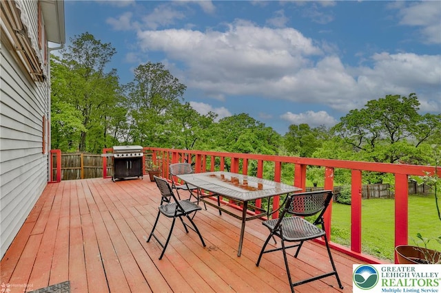 717 Frost Hollow Rd, Easton, PA 18040 - deck featuring outdoor dining space, a grill, and view of scattered trees