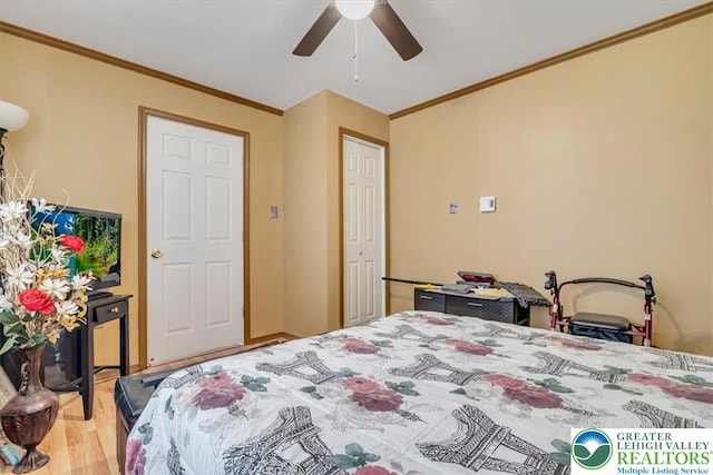 1281 Winding Way, Coolbaugh Twp, PA 18466 - bedroom featuring crown molding, wood finished floors, and a ceiling fan