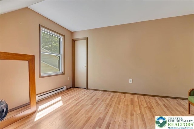 1281 Winding Way, Coolbaugh Twp, PA 18466 - spare room with baseboard heating, light wood-style flooring, and baseboards