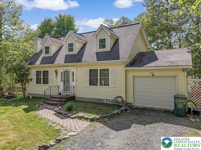 1281 Winding Way, Coolbaugh Twp, PA 18466 - cape cod-style house with an attached garage, a front yard, and driveway