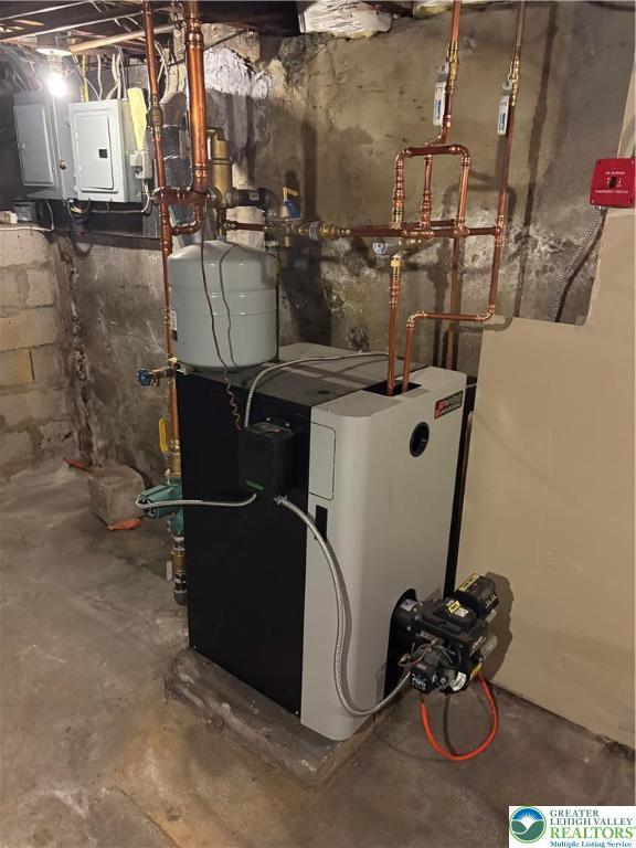 2101 Columbia Ave, Whitehall Twp, PA 18052 - utility room featuring electric panel and a heating unit