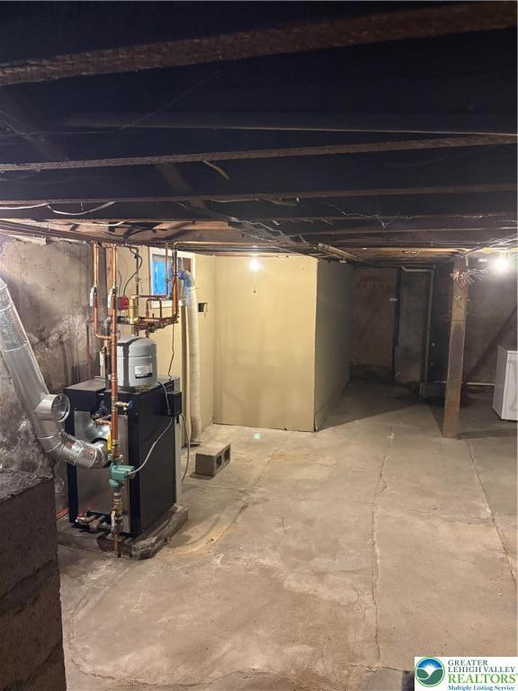 2101 Columbia Ave, Whitehall Twp, PA 18052 - unfinished below grade area with a heating unit