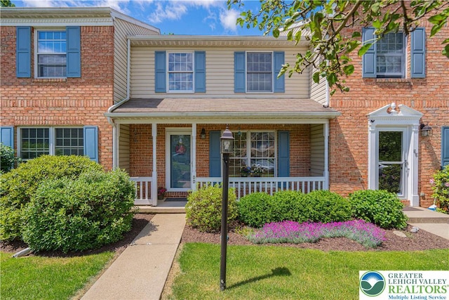 1514 Ravena St Unit Dd, Bethlehem City, PA 18015 - townhome / multi-family property with covered porch and brick siding