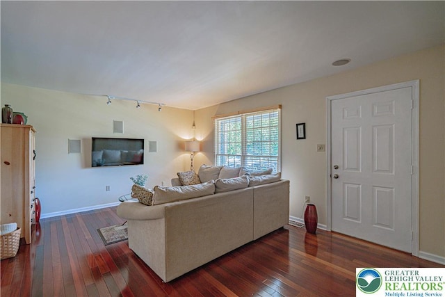 1514 Ravena St Unit Dd, Bethlehem City, PA 18015 - living area featuring dark wood-style floors, baseboards, and rail lighting