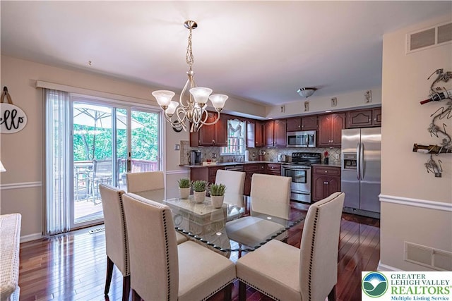 1514 Ravena St Unit Dd, Bethlehem City, PA 18015 - dining space with a chandelier, dark wood-style floors, and baseboards