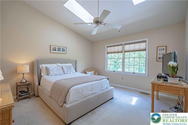 1514 Ravena St Unit Dd, Bethlehem City, PA 18015 - bedroom featuring light colored carpet, baseboards, a skylight, vaulted ceiling, and a ceiling fan