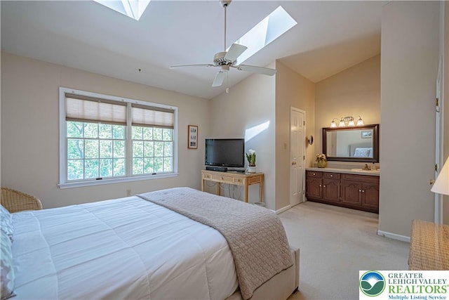 1514 Ravena St Unit Dd, Bethlehem City, PA 18015 - bedroom featuring a skylight, vaulted ceiling, light colored carpet, baseboards, and connected bathroom