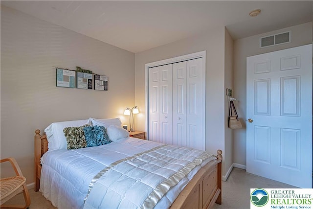 1514 Ravena St Unit Dd, Bethlehem City, PA 18015 - bedroom with light carpet, baseboards, and a closet