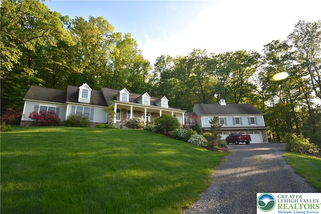 135 Coffeetown Rd, Easton, PA 18042 - new england style home with a garage, a front yard, asphalt driveway, and a porch