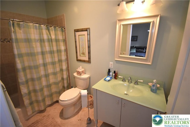 135 Coffeetown Rd, Easton, PA 18042 - bathroom featuring vanity, toilet, shower / bath combo with shower curtain, and tile patterned floors