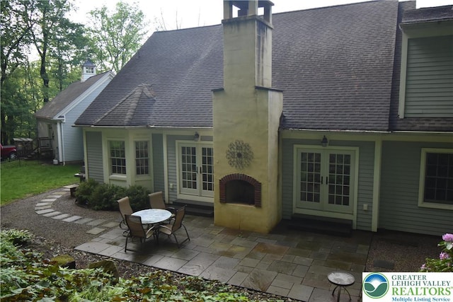 135 Coffeetown Rd, Easton, PA 18042 - rear view of property with french doors, a shingled roof, a chimney, and a patio area