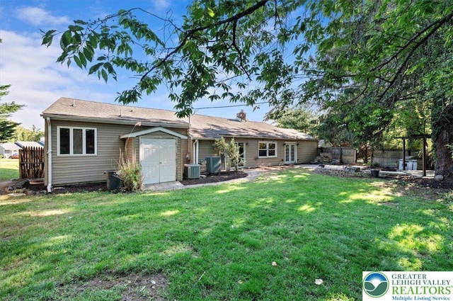 215 N Laurel Ln, West Whiteland Township, PA 19341 - rear view of property featuring cooling unit and a garage