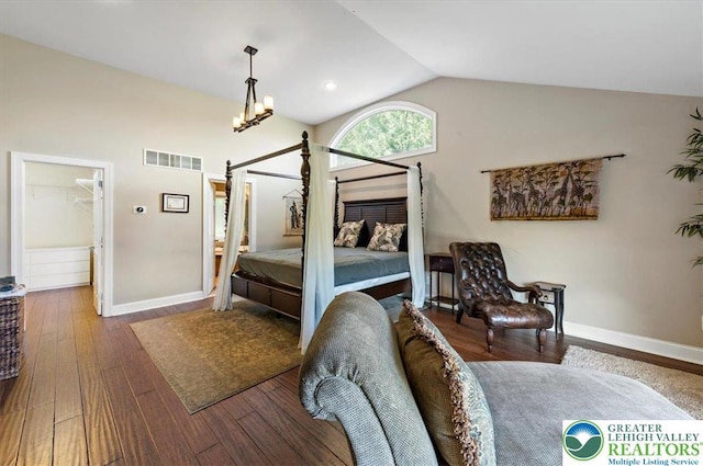 215 N Laurel Ln, West Whiteland Township, PA 19341 - bedroom featuring vaulted ceiling, baseboards, wood finished floors, and a chandelier