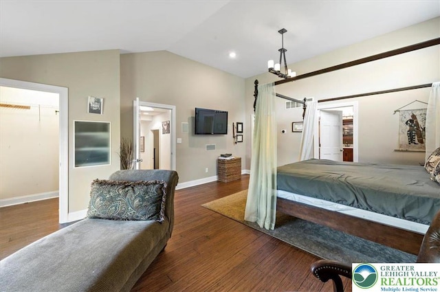 215 N Laurel Ln, West Whiteland Township, PA 19341 - bedroom featuring lofted ceiling, wood finished floors, baseboards, a barn door, and a chandelier