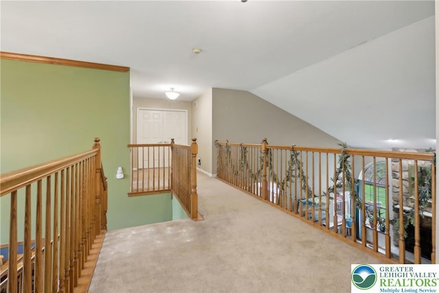 136 Outlook Ct, Middle Smithfield Twp, PA 18302 - corridor featuring carpet flooring, lofted ceiling, and an upstairs landing
